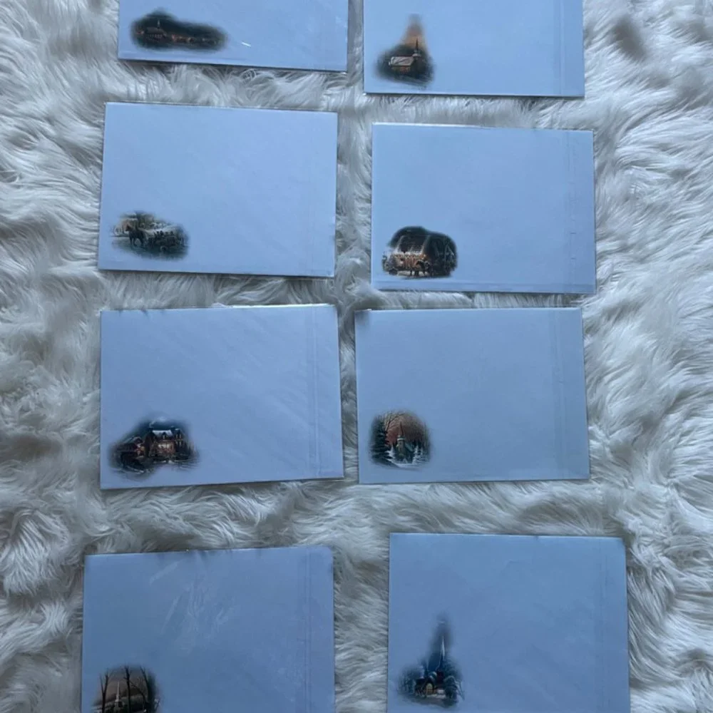 8 Holiday cards set individually sealed in plastic with matching print envelope
